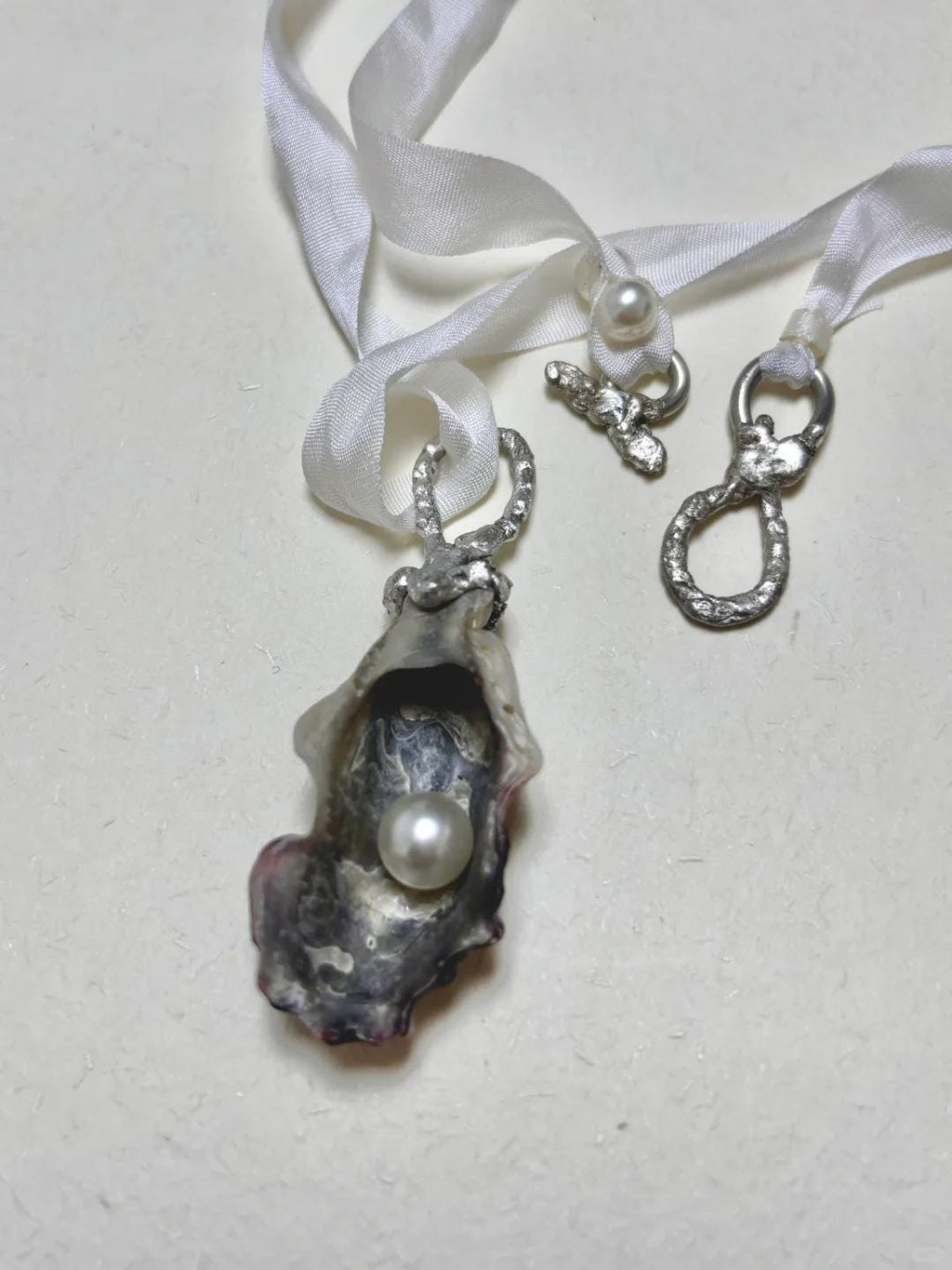Shell Pearl Talisman — artwork and styling view 2