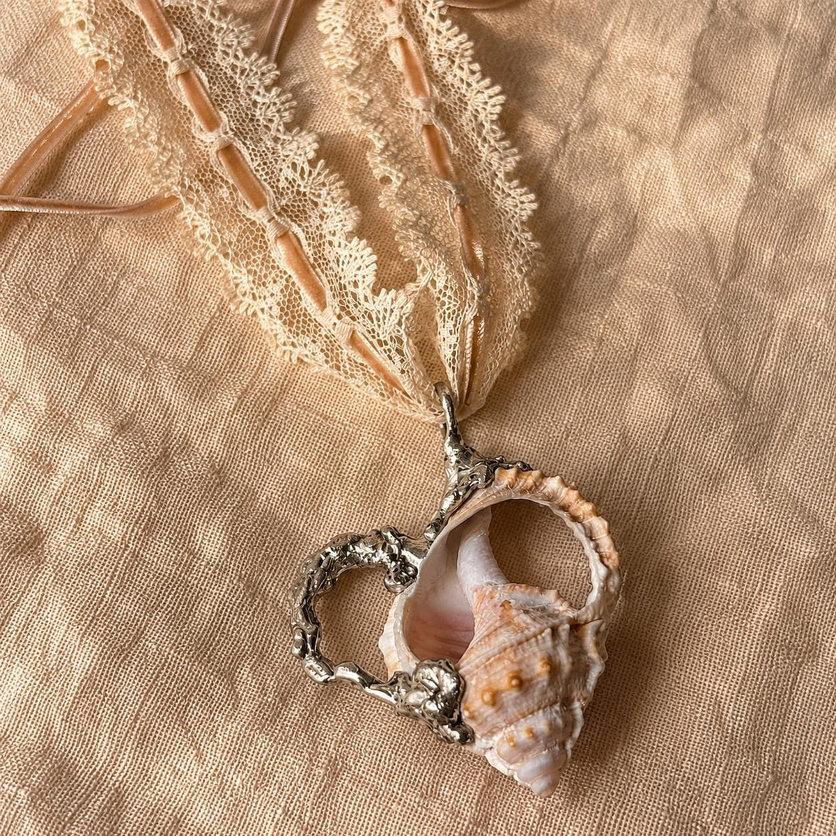 Spiked Conch Loop Talisman